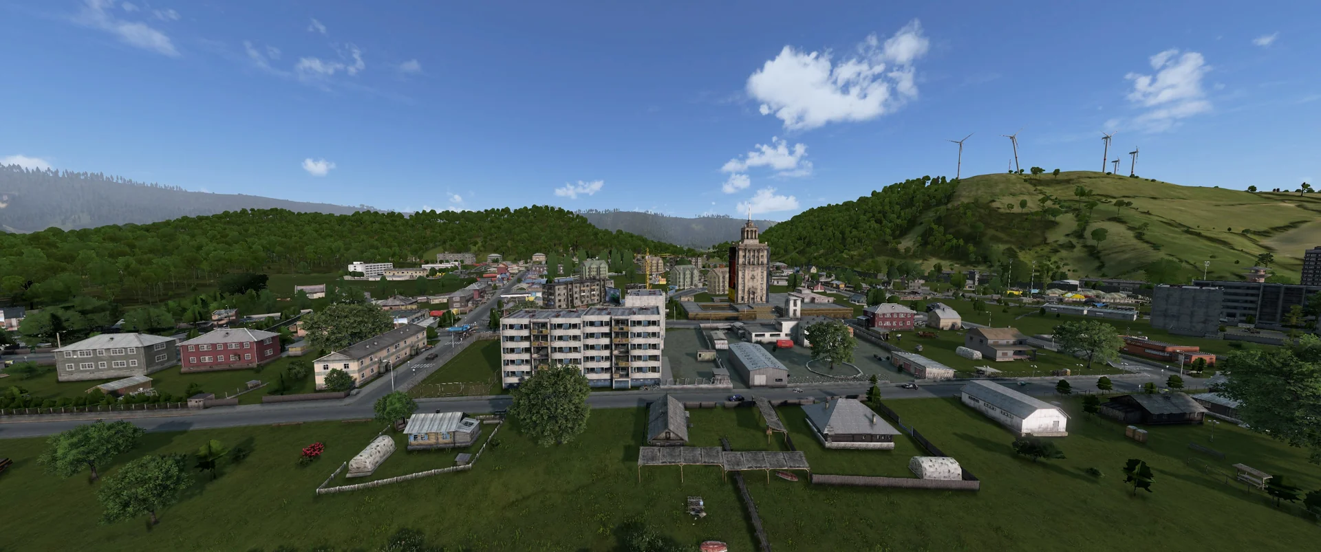 Aerial view of Cedro with wind turbines